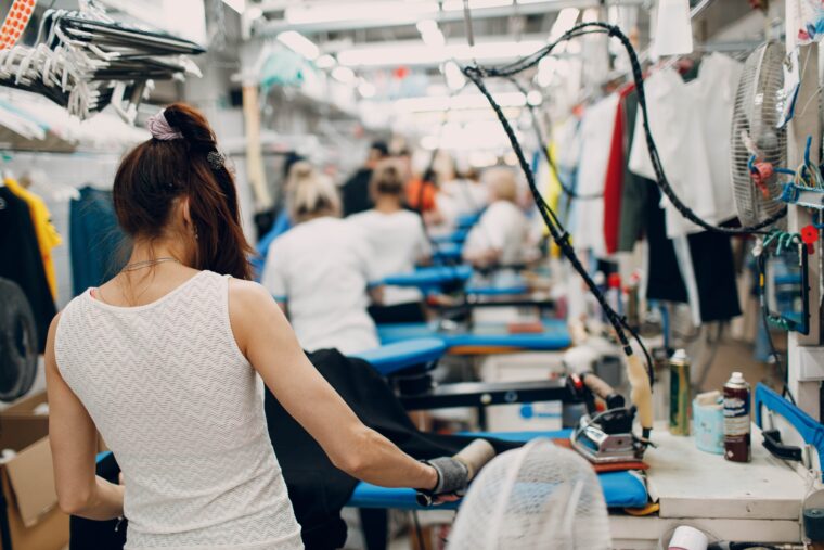 A woman working in a clothing factory