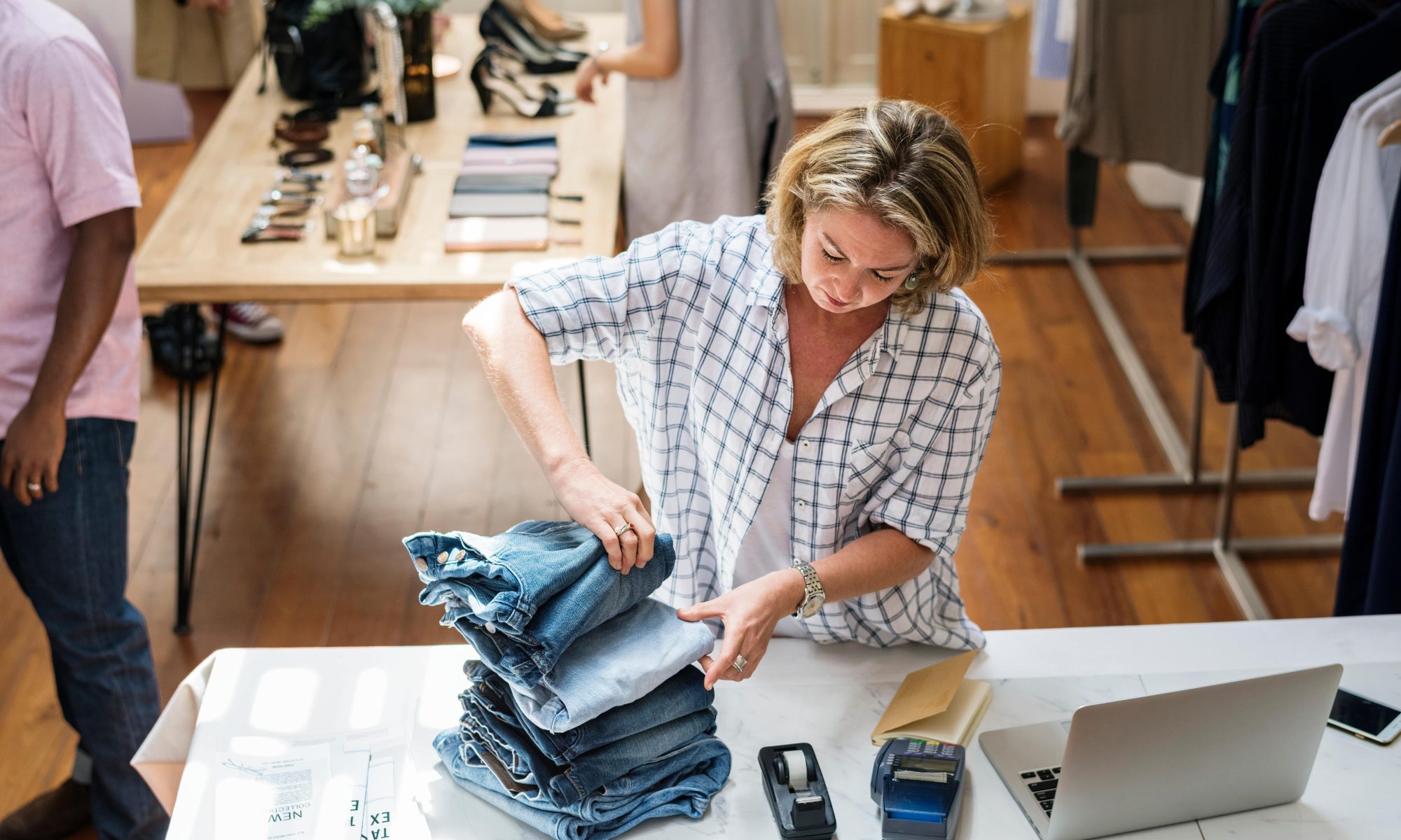 Designer counting inventory in studio