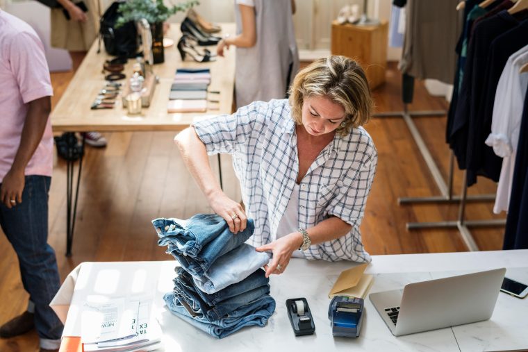 Designer counting inventory in studio