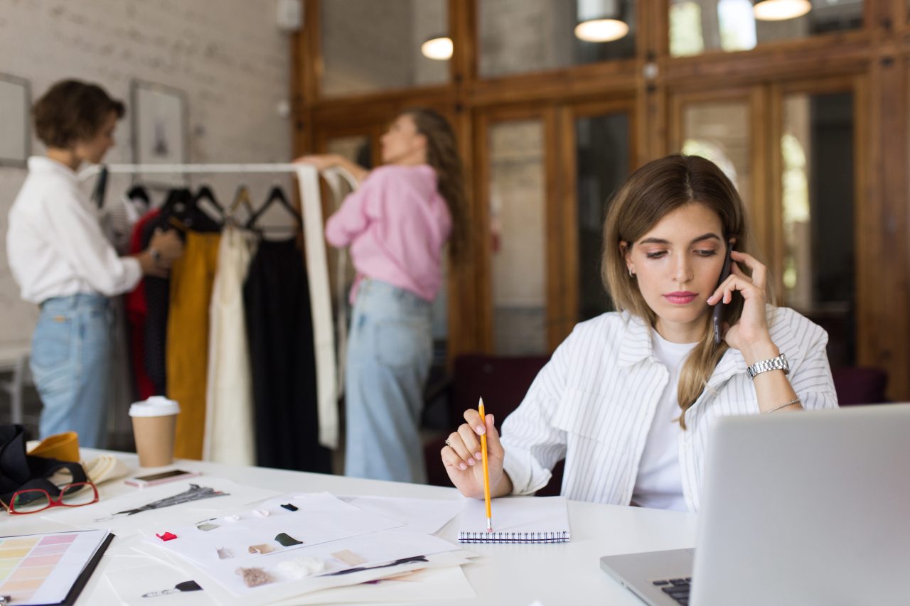 Woman working in a small fashion office