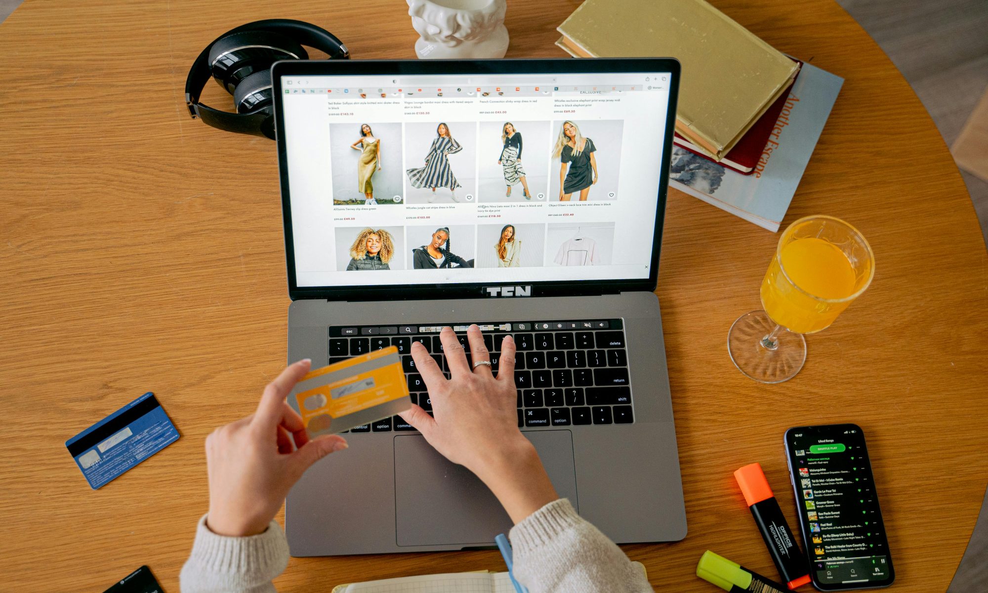 Someone shopping online on their laptop