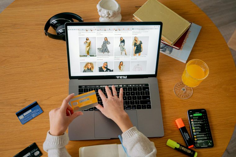 Someone shopping online on their laptop
